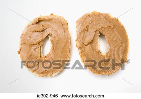 Peanut butter on bagels View Large Photo Image Stock Photograph - Peanut butter on bagels. Fotosearch