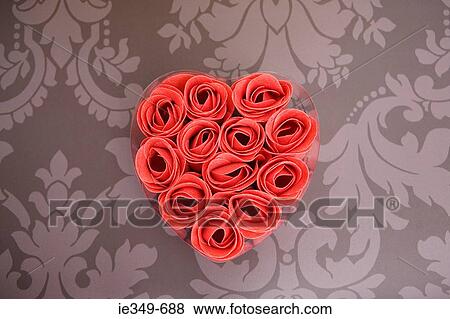 Artificial roses in heart shape View Large Photo Image Stock Photo - Artificial roses in heart shape. Fotosearch