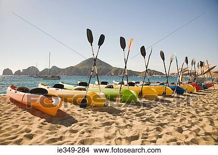 Canoes on luxury beach resort View Large Photo Image Picture - Canoes on luxury beach resort. Fotosearch