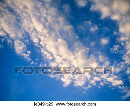 Stock Photo - Clouds in sky. Fotosearch
