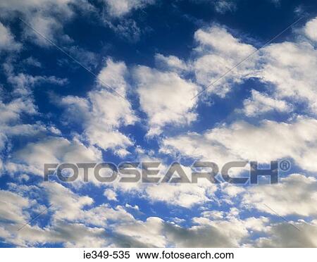 Clouds in sky View Large Photo Image Stock Photography - Clouds in sky. Fotosearch
