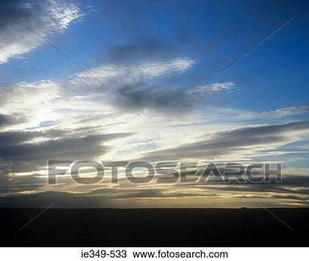 Clouds over land View Large Photo Image Stock Image - Clouds over land. Fotosearch