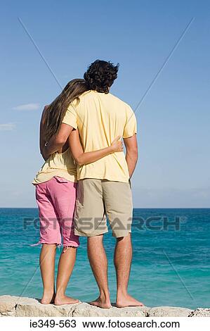Couple by the sea View Large Photo Image Stock Image - Couple by the sea. Fotosearch