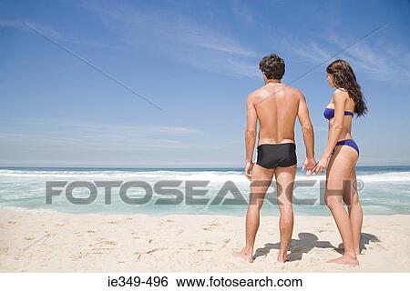 Couple by the sea View Large Photo Image Stock Photograph - Couple by the sea. Fotosearch