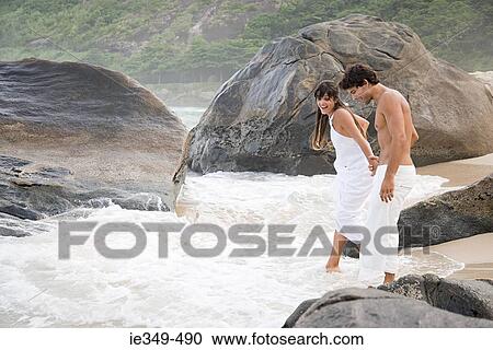Couple in the sea View Large Photo Image Stock Image - Couple in the sea. Fotosearch