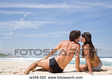 Couple kissing by the sea View Large Photo Image Stock Image - Couple kissing by the sea. Fotosearch