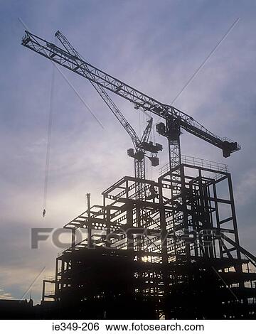 Cranes and construction frame View Large Photo Image Stock Photograph - Cranes and construction frame. Fotosearch