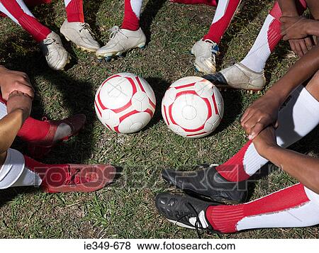 Footballs and legs of footballers View Large Photo Image Stock Photo - Footballs and legs of footballers. Fotosearch