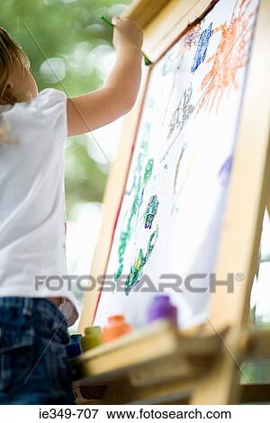 Girl painting View Large Photo Image Stock Photo - Girl painting. Fotosearch
