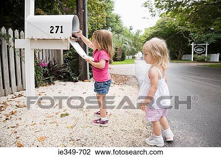Girls and mailbox View Large Photo Image Stock Image - Girls and mailbox. Fotosearch