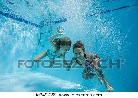 Girls in swimming pool View Large Photo Image Stock Photo - Girls in swimming pool. Fotosearch