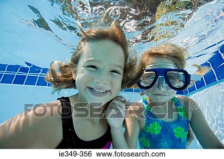 Girls in swimming pool View Large Photo Image Stock Photograph - Girls in swimming pool. Fotosearch