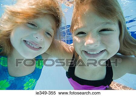 Girls in swimming pool View Large Photo Image Stock Photography - Girls in swimming pool. Fotosearch