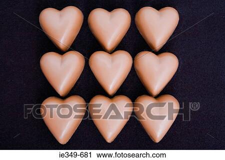 Heart shaped chocolates View Large Photo Image Stock Image - Heart shaped chocolates. Fotosearch