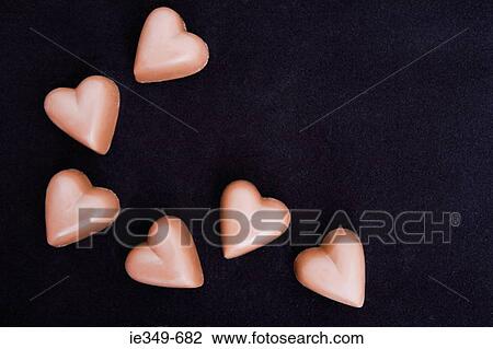 Heart shaped chocolates View Large Photo Image Stock Image - Heart shaped chocolates. Fotosearch