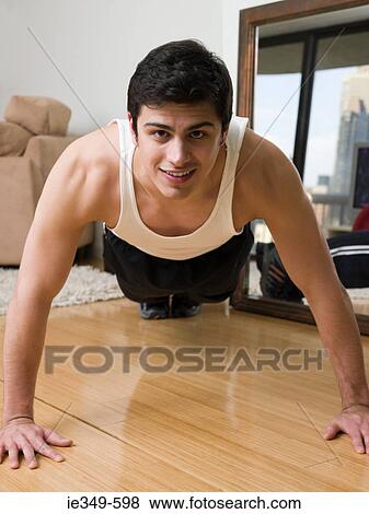 Man doing push ups View Large Photo Image Stock Photo - Man doing push ups. Fotosearch