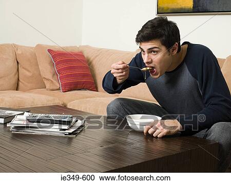 Man eating soup View Large Photo Image Stock Image - Man eating soup. Fotosearch
