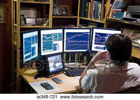 Man looking at graphs View Large Photo Image Stock Image - Man looking at graphs. Fotosearch