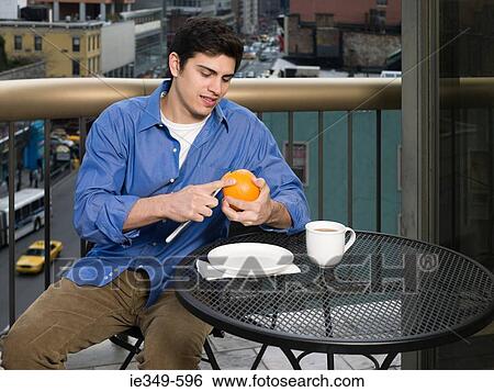 Man on a balcony View Large Photo Image Stock Photograph - Man on a balcony. Fotosearch