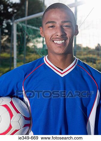 Portrait of a footballer View Large Photo Image Stock Photo - Portrait of a footballer. Fotosearch
