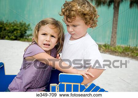 Sister and brother fighting View Large Photo Image Stock Photo - Sister and brother fighting. Fotosearch