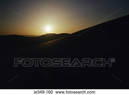 Sunset over dunes of the sahara View Large Photo Image Stock Image - Sunset over dunes of the sahara. Fotosearch