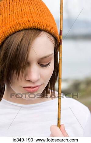 Woman with fishing rod View Large Photo Image Stock Image - Woman with fishing rod. Fotosearch