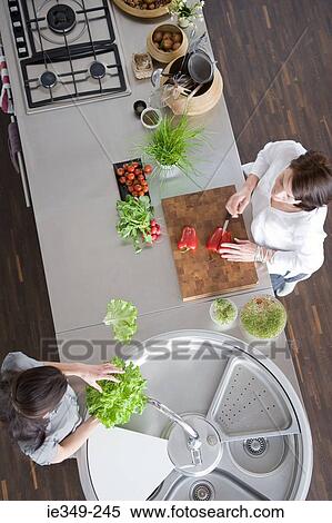 Women preparing salad View Large Photo Image Stock Photography - Women preparing salad. Fotosearch