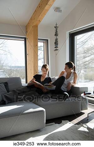 Women relaxing at home View Large Photo Image Stock Image - Women relaxing at home. Fotosearch