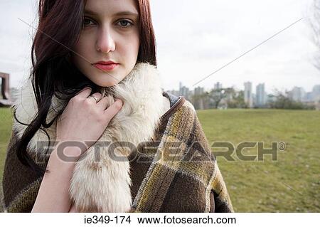 Young woman outdoors View Large Photo Image Picture - Young woman outdoors. Fotosearch