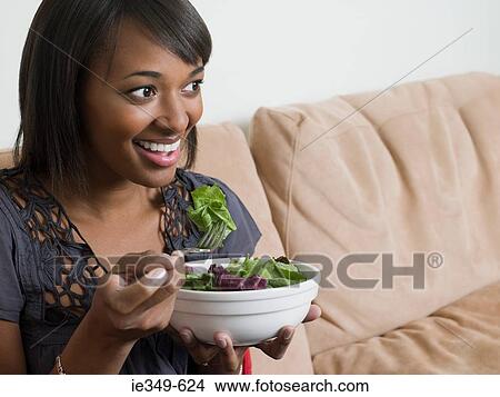 Young woman with salad View Large Photo Image Picture - Young woman with salad. Fotosearch