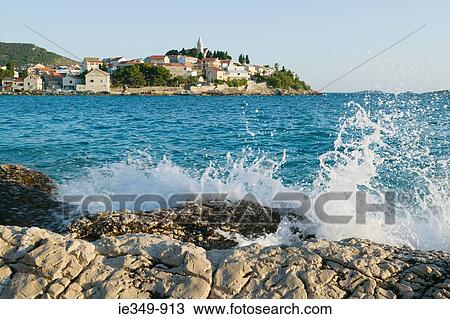 Sea splashing rocks at primosten View Large Photo Image Stock Image - Sea splashing rocks at primosten. Fotosearch