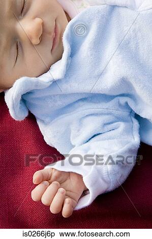 A baby sleeping View Large Photo Image Stock Photography - A baby sleeping. Fotosearch