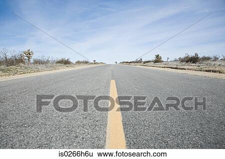 Highway through the Californian salt flats View Large Photo Image Stock Photograph - Highway through the Californian salt flats. Fotosearch