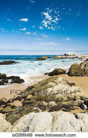 Rocks on a beach in Chile View Large Photo Image Stock Photo - Rocks on a beach in Chile. Fotosearch