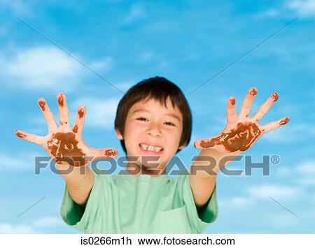 A boy with chocolate covered hands View Large Photo Image Stock Image - A boy with chocolate covered hands. Fotosearch