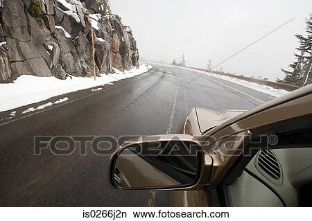A car on a road View Large Photo Image Picture - A car on a road. Fotosearch