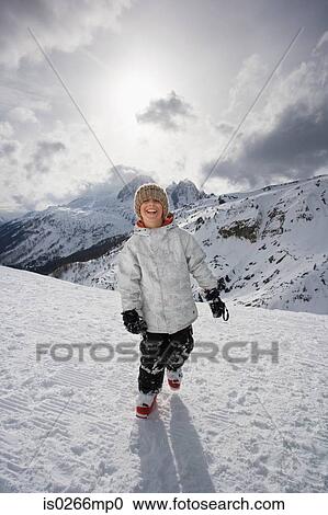 Boy at ski resort View Large Photo Image Stock Image - Boy at ski resort. Fotosearch