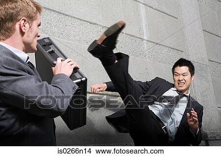 Businessman attacking View Large Photo Image Picture - Businessman attacking. Fotosearch