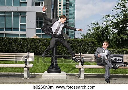 Businessman jumping View Large Photo Image Picture - Businessman jumping. Fotosearch
