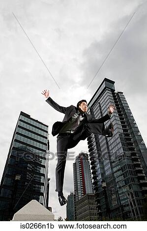 Businessman jumping View Large Photo Image Stock Image - Businessman jumping. Fotosearch