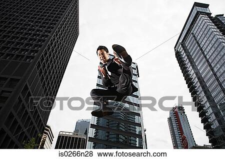 Businessman kicking View Large Photo Image Stock Photo - Businessman kicking. Fotosearch