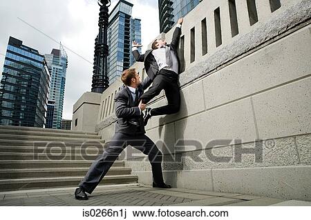 Businessman trying to escape View Large Photo Image Stock Image - Businessman trying to escape. Fotosearch