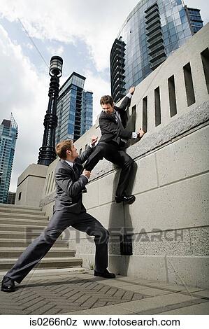 Stock Photo - Businessman trying to escape. Fotosearch