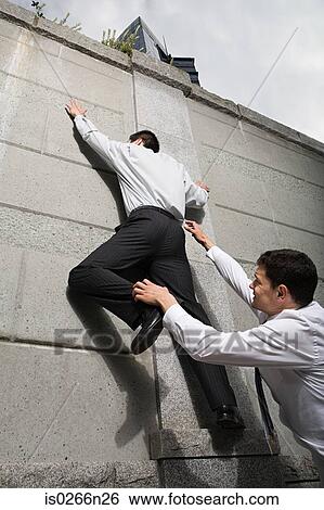 Stock Photograph - Businessman trying to escape. Fotosearch