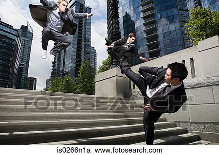 Businessmen fighting View Large Photo Image Stock Image - Businessmen fighting. Fotosearch