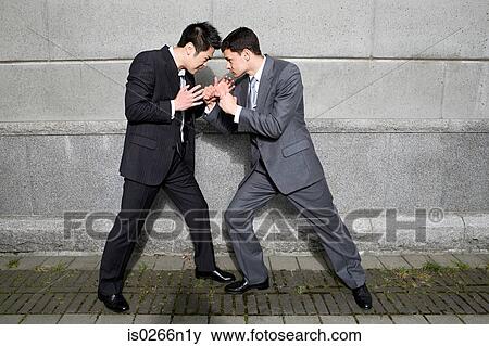 Businessmen fighting View Large Photo Image Stock Photo - Businessmen fighting. Fotosearch