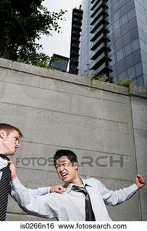 Businessmen fighting View Large Photo Image Stock Photograph - Businessmen fighting. Fotosearch