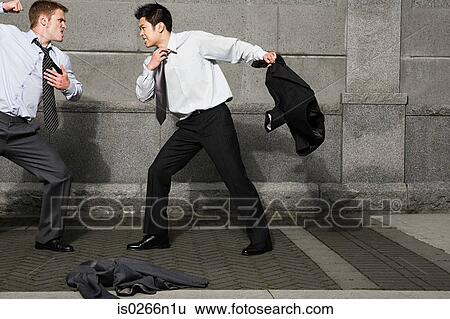 Businessmen fighting View Large Photo Image Stock Photograph - Businessmen fighting. Fotosearch
