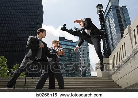 Businessmen fighting View Large Photo Image Stock Photography - Businessmen fighting. Fotosearch